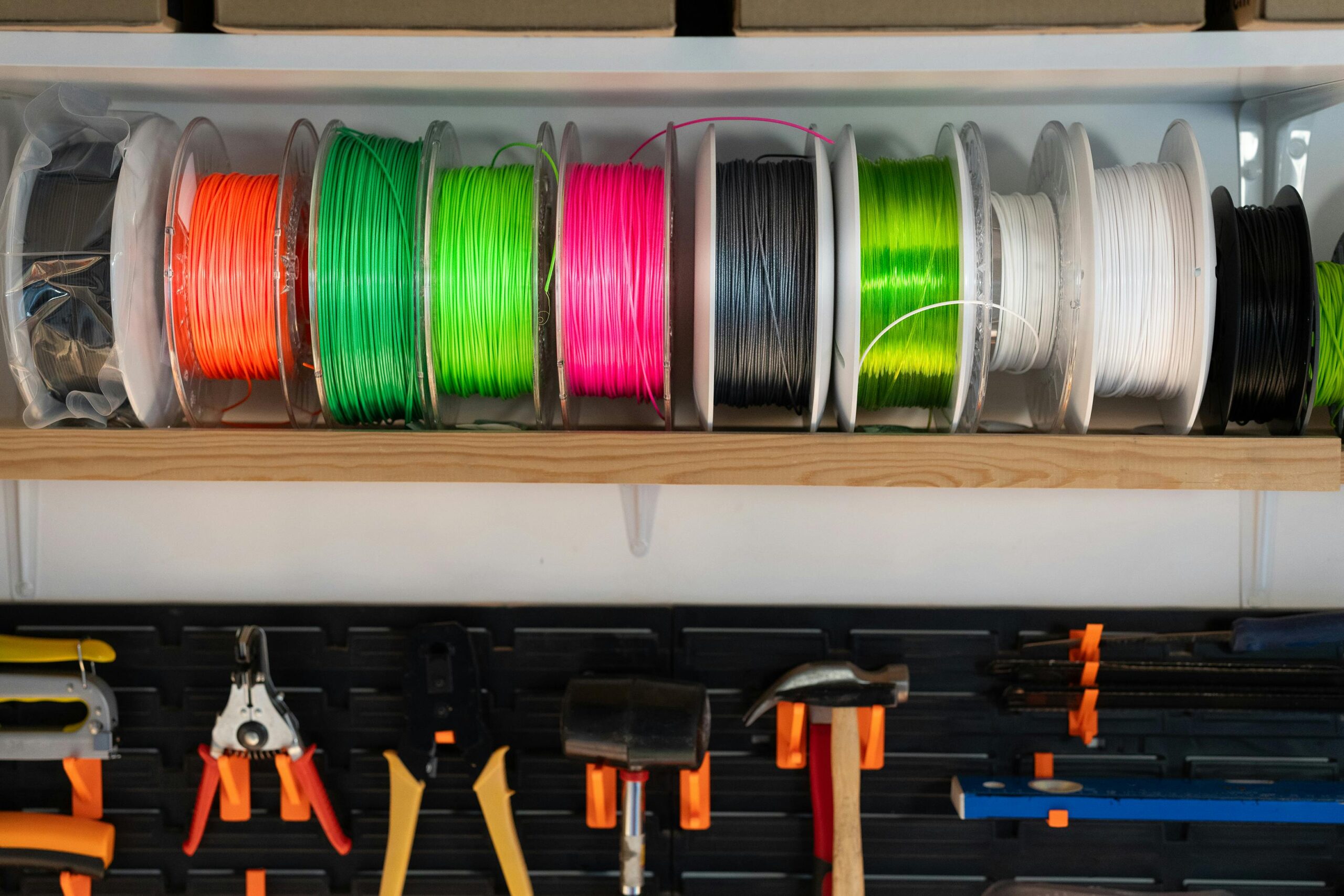 Colorful 3D printing filament spools stored together