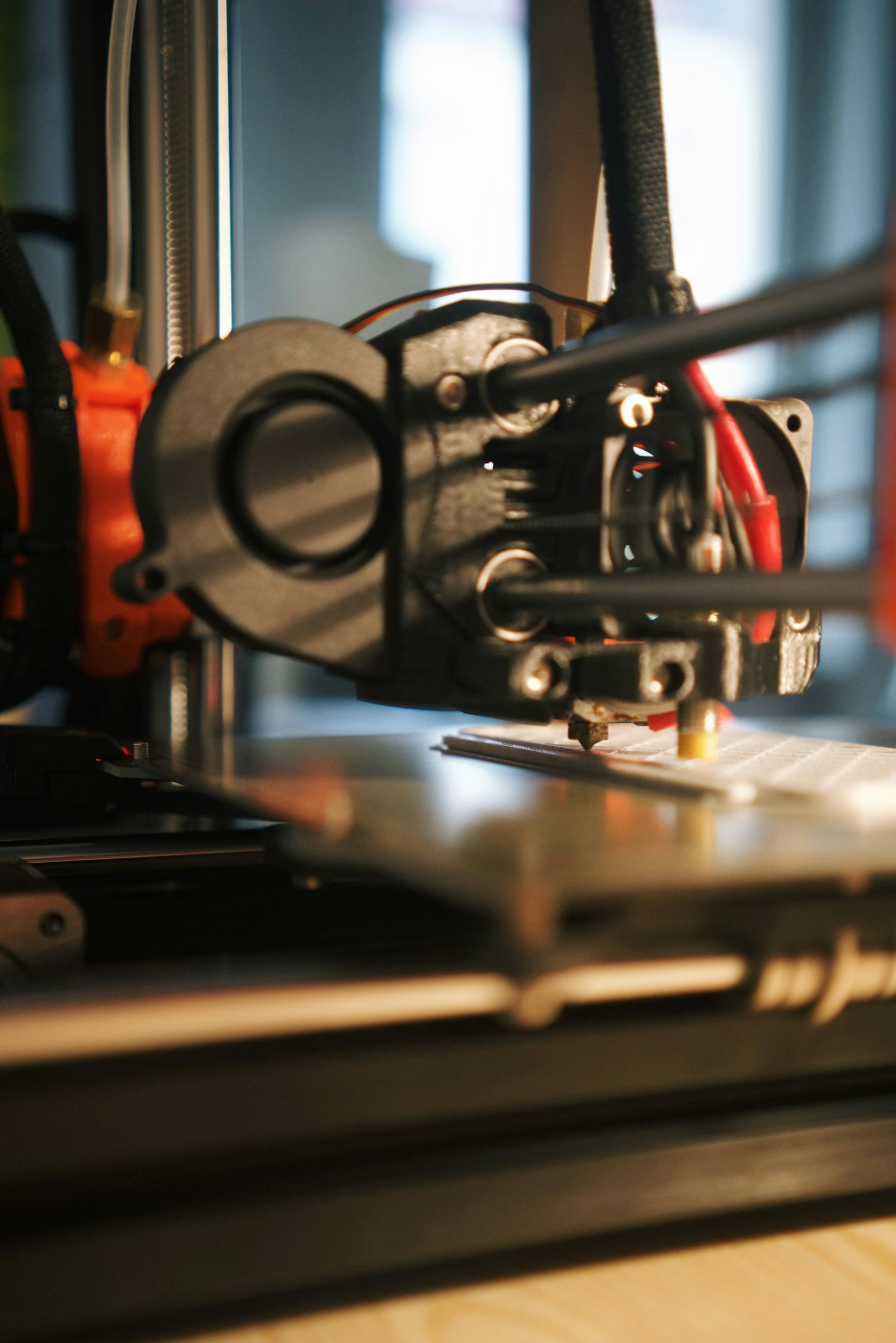 Best filament for Bambu A1 Mini β filament spool mounted on a desktop 3D printer