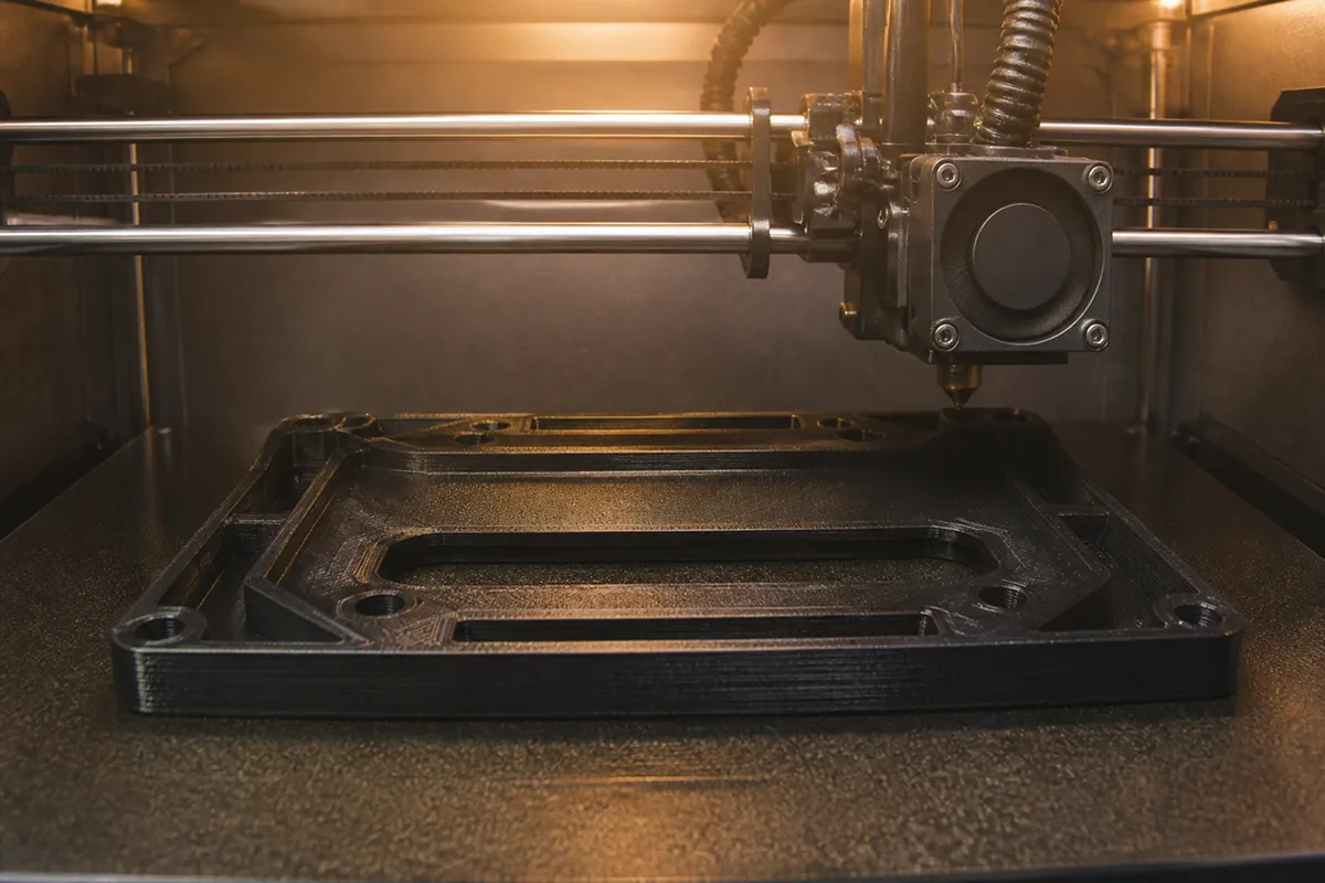 The X2D heated chamber keeps large ABS and ASA prints flat — a key part of the engineering-material compatibility story