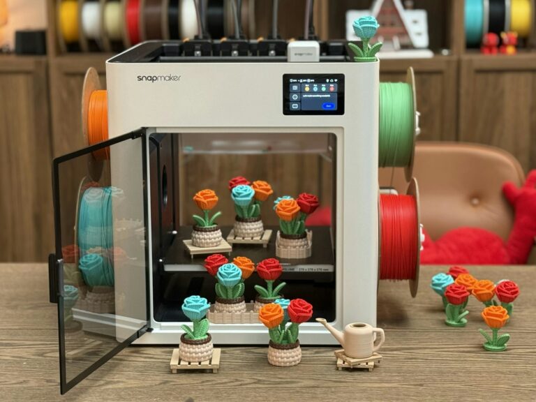 Best filament for multi-color printing — 3D printer with colorful rose prints and filament spools