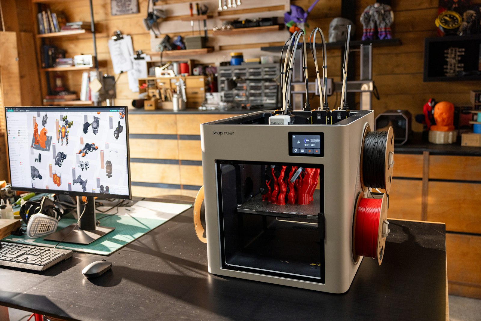 Best PETG filament for Bambu P2S — 3D printer with PETG filament spools in a workshop