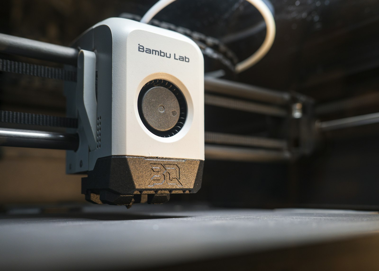 How to print PC on Bambu Lab — printer toolhead extruding at high temperature