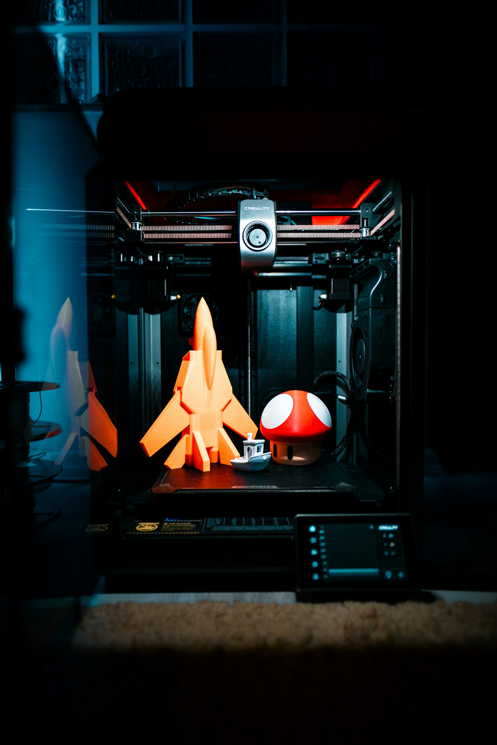 petg hf replacement options — 3D printer with filament on a work table